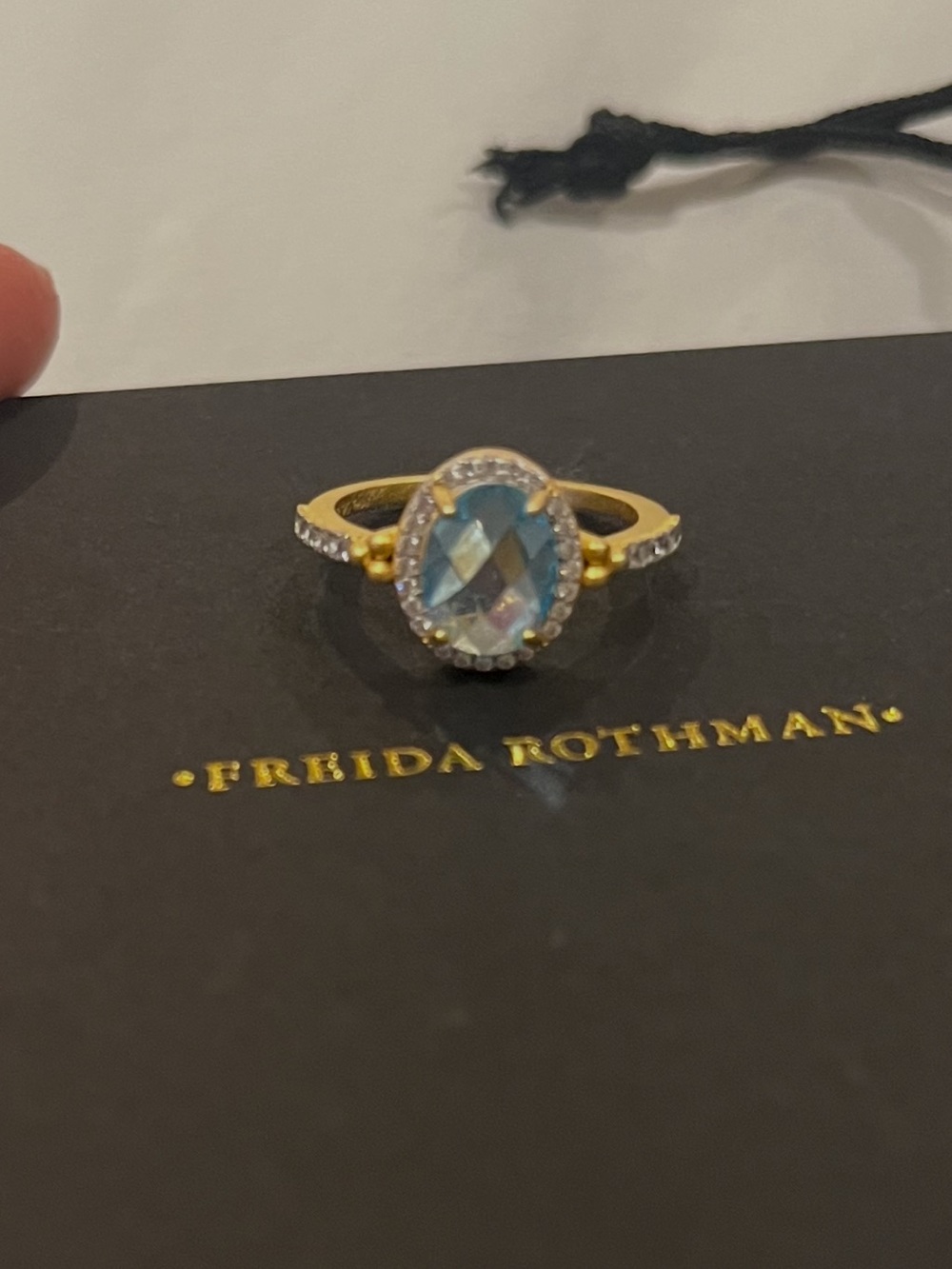 Size 7 Freida Rothman with Blue Oval Center and Pavé Halo